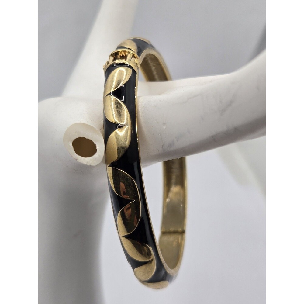 Hinged Bangle Bracelet. Features Black Enamel Background with Gold Crescents